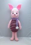 piglet with winter scarf